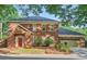 Charming two-story brick home with a well-manicured lawn and attached two-car garage at 7155 Roswell Rd # 58, Atlanta, GA 30328