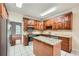 Bright kitchen showcasing custom cabinets, stainless appliances and granite counters at 7155 Roswell Rd # 58, Atlanta, GA 30328