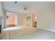Spacious living room featuring a fireplace and views into the formal dining room at 7155 Roswell Rd # 58, Atlanta, GA 30328
