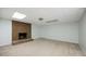 Unfinished basement with a brick fireplace and neutral-colored walls at 1595 Bakers Glen Dr, Atlanta, GA 30350
