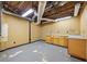 Unfinished basement with exposed ductwork and space for storage at 1595 Bakers Glen Dr, Atlanta, GA 30350