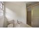 Bright bathroom with toilet, bidet, and a glass-enclosed shower at 1595 Bakers Glen Dr, Atlanta, GA 30350