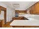 Bright kitchen featuring wood cabinets, stainless steel appliances, and ample counter space at 1595 Bakers Glen Dr, Atlanta, GA 30350
