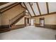 Expansive living room featuring high ceilings, built-in shelving, and a staircase at 1595 Bakers Glen Dr, Atlanta, GA 30350