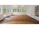 Sunroom with brick flooring, several windows, and access to the outdoors at 1595 Bakers Glen Dr, Atlanta, GA 30350