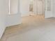 Neutral bedroom with white walls, and carpet flooring and a view to the bath area at 230 Collins View Ct, Lawrenceville, GA 30043