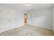 Bright bedroom with spacious closet and neutral finishes offers versatile space at 230 Collins View Ct, Lawrenceville, GA 30043