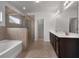 The primary bathroom features a tub and shower at 2537 Sori Dr, Buford, GA 30519