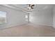 This spacious bedroom features carpet and large windows at 2537 Sori Dr, Buford, GA 30519