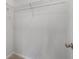 A view of the closet with carpet flooring, a door, and wire shelving at 2537 Sori Dr, Buford, GA 30519
