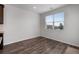 Bright dining room area features laminate flooring and plenty of sunlight at 2537 Sori Dr, Buford, GA 30519