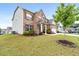 Well-kept brick home with lovely landscaping, enhancing its inviting exterior view at 2537 Sori Dr, Buford, GA 30519