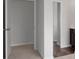 Bright hallway featuring neutral paint and stylish flooring at 2537 Sori Dr, Buford, GA 30519