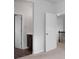 Hallway view with two entry ways and a staircase at 2537 Sori Dr, Buford, GA 30519