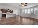 Open living area with hardwood floors, a large island, and lots of natural light at 2537 Sori Dr, Buford, GA 30519
