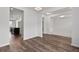 Open-concept living room with seamless access to kitchen and other living areas at 2537 Sori Dr, Buford, GA 30519