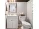 Powder room with a modern vanity and hardwood floors at 525 Arbor Creek Ct, Roswell, GA 30076