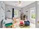 Bright room with playful décor and windows offering lots of natural light at 525 Arbor Creek Ct, Roswell, GA 30076