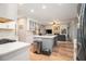 Open concept kitchen with stainless steel appliances and island open to living area at 525 Arbor Creek Ct, Roswell, GA 30076