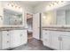 Main bathroom features dual vanities and access to a private shower at 525 Arbor Creek Ct, Roswell, GA 30076