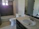Bathroom featuring a tub and shower combination, with a vanity and tile flooring at 7217 Union Grove Rd, Lithonia, GA 30058