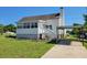 Charming home with a well-maintained yard and convenient carport at 7217 Union Grove Rd, Lithonia, GA 30058