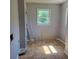Laundry room with linoleum flooring and natural light at 7217 Union Grove Rd, Lithonia, GA 30058