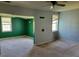 Comfortable living room with large windows and an open layout at 7217 Union Grove Rd, Lithonia, GA 30058