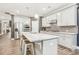 Modern kitchen with stainless steel appliances, a large island, and granite countertops at 160 Amherst Way, Fayetteville, GA 30215