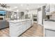Open-concept kitchen featuring a center island, stainless appliances, and modern cabinetry at 160 Amherst Way, Fayetteville, GA 30215