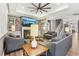 Spacious living room with a fireplace, TV, and comfortable seating arrangement at 160 Amherst Way, Fayetteville, GA 30215