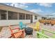 Relax on the patio with Adirondack chairs and enjoy the fire pit on cool evenings at 160 Amherst Way, Fayetteville, GA 30215