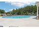Community pool offers a refreshing escape with plenty of space to lounge and soak up the sun at 160 Amherst Way, Fayetteville, GA 30215