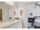 Bright bathroom featuring a large mirror, vanity, and access to an adjacent bedroom at 3585 Roxboro Ne Rd # 2, Atlanta, GA 30326