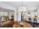 Eat-in kitchen with white cabinets, stainless steel appliances, and hardwood floors at 3585 Roxboro Ne Rd # 2, Atlanta, GA 30326