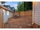 Relaxing backyard featuring a charming wooden swing set and meticulously maintained surroundings at 1583 Braeburn Se Dr, Atlanta, GA 30316