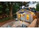 Charming backyard patio with string lights, seating, and inviting atmosphere at 1583 Braeburn Se Dr, Atlanta, GA 30316