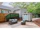 Relaxing backyard retreat with deck, shed, and comfortable outdoor furniture at 1583 Braeburn Se Dr, Atlanta, GA 30316