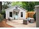 Backyard with outdoor seating area and well-maintained landscaping at 1583 Braeburn Se Dr, Atlanta, GA 30316