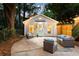 Outdoor patio space with stylish furniture, perfect for entertaining guests on warm nights at 1583 Braeburn Se Dr, Atlanta, GA 30316