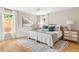 A serene bedroom with hardwood floors, soft natural light and calming colors creating a peaceful retreat at 1583 Braeburn Se Dr, Atlanta, GA 30316