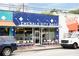 Exterior shot of Emerald City Bagels, a building featuring blue tile and outdoor seating at 1583 Braeburn Se Dr, Atlanta, GA 30316