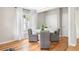Bright dining room with hardwood floors and stylish furniture set against a neutral color palette at 1583 Braeburn Se Dr, Atlanta, GA 30316