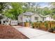 Charming bungalow with a fenced yard, garden, and detached garage/studio at 1583 Braeburn Se Dr, Atlanta, GA 30316