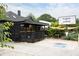 Exterior view of Plants + Coffee, with a welcoming patio and clear signage at 1583 Braeburn Se Dr, Atlanta, GA 30316