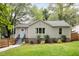 Well-manicured front yard and covered entryway create a welcoming entrance to this inviting home at 1583 Braeburn Se Dr, Atlanta, GA 30316