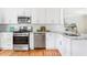 Modern kitchen with stainless steel appliances and granite countertops at 1583 Braeburn Se Dr, Atlanta, GA 30316