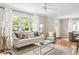 The large window lets in natural light to the living room, adding to its welcoming atmosphere at 1583 Braeburn Se Dr, Atlanta, GA 30316