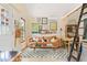 Cozy living room featuring leather sofa, ladder, and decor at 1583 Braeburn Se Dr, Atlanta, GA 30316