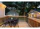 Cozy wooden deck with dining table, ideal for relaxing and enjoying outdoor meals at 1583 Braeburn Se Dr, Atlanta, GA 30316